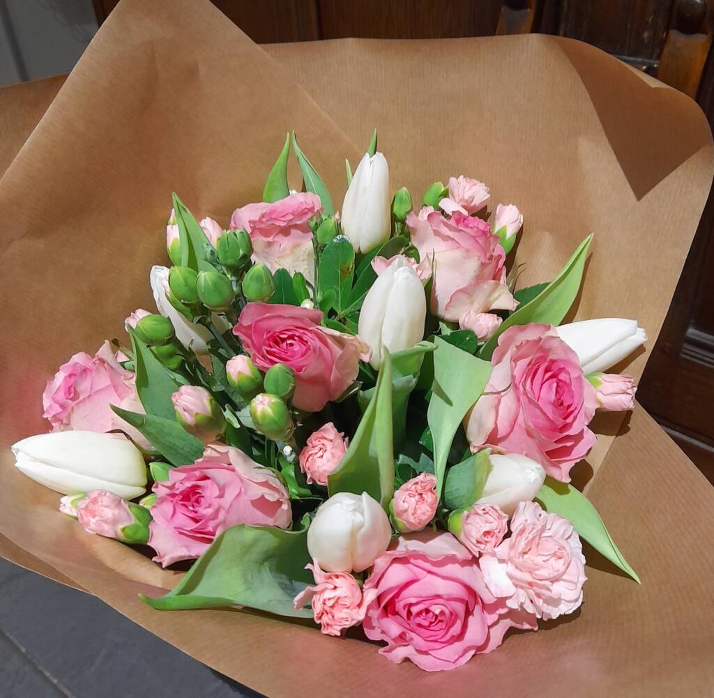 bouquet of pink flowers, tulips, spray carnations and foliage