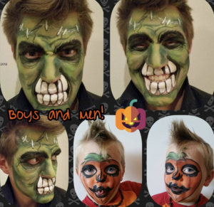 Man and boy with spooky halloween face painting. Man is a green monster with large teeth, and young boy is a cute and cheeky pumpkin